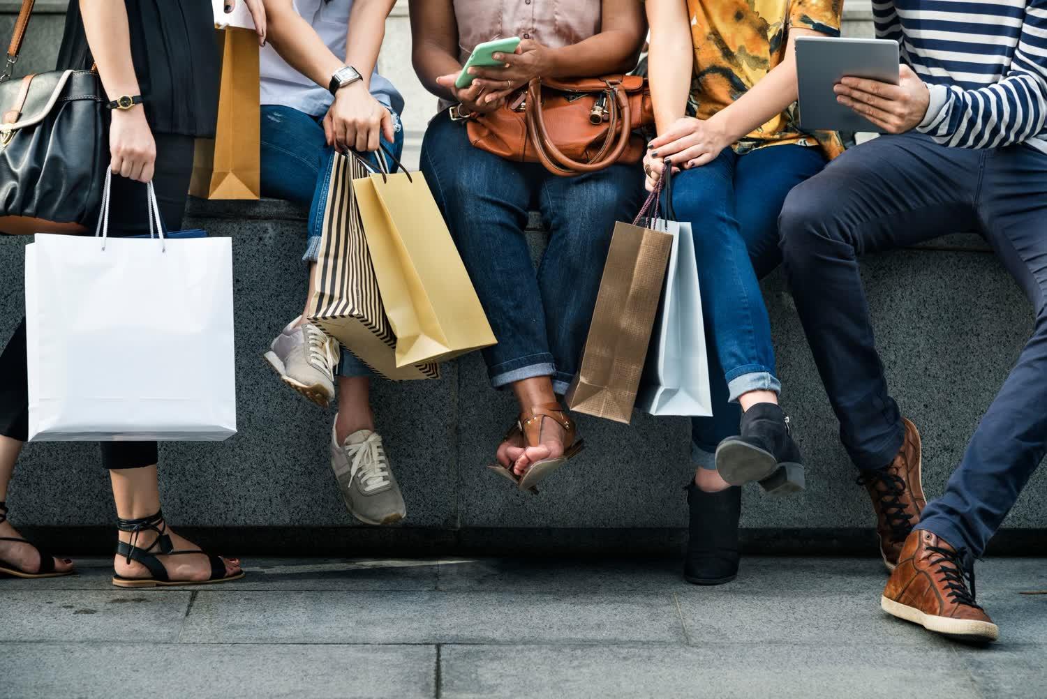 Friends sharing shopping finds together