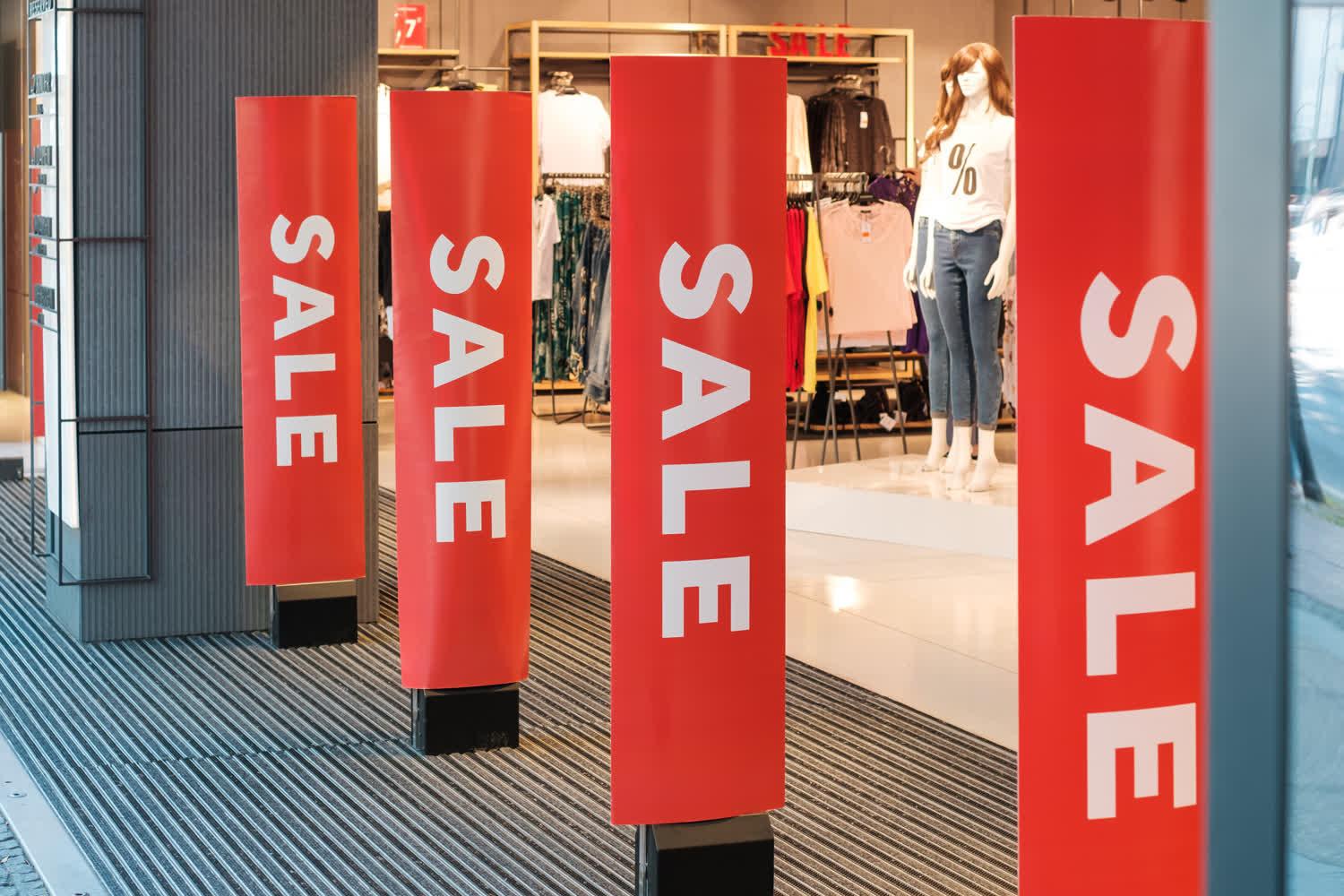 Store sale signage with deals to discover